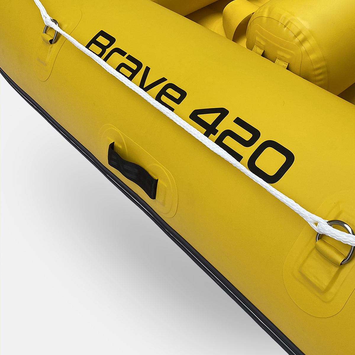 Yellow inflatable raft side panel with black seam and handles; Brave 420 marking