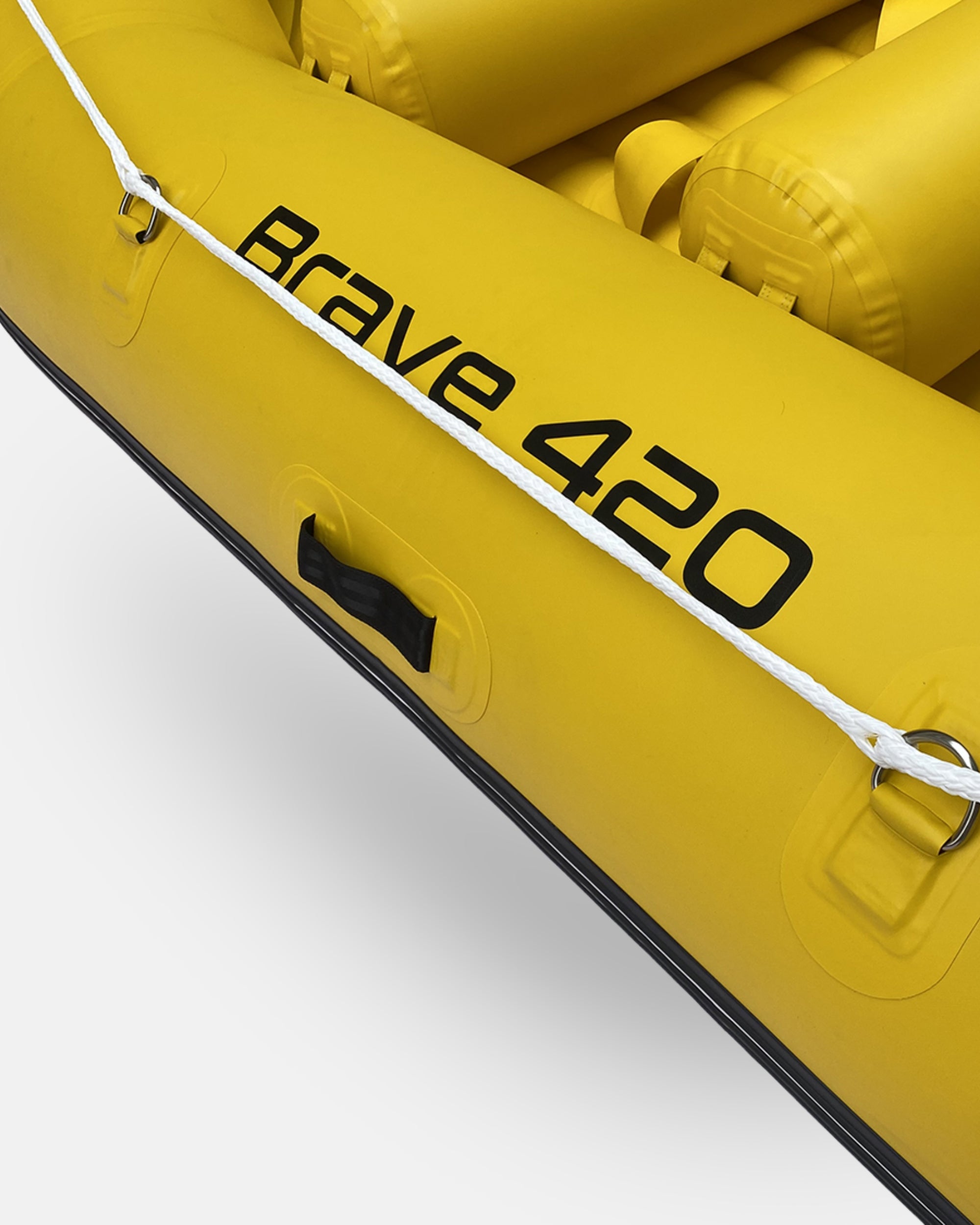 Yellow inflatable raft side with Brave 420 branding and white tie rope