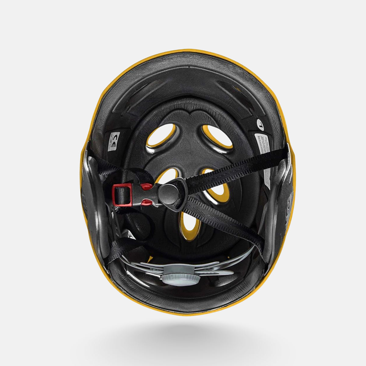 Black helmet interior with webbing straps and adjustable dial