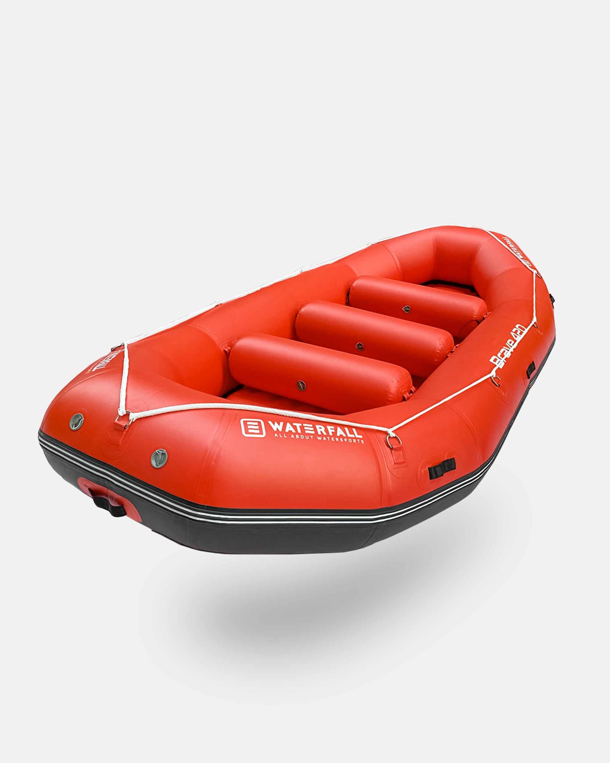 Red inflatable raft with three front seats and black hull trim